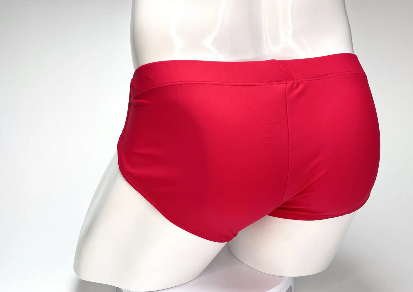 Wildmant big boy pouch swim brief in red with smooth satin fabric and snug fit for swimming and beachwear