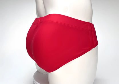WildmanT Big Boy Pouch swim brief in bright red, shown from the back on a white mannequin.