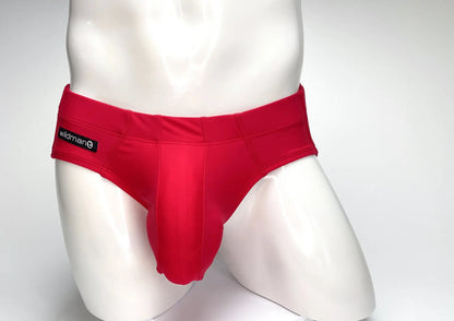 Wildmant big boy pouch swim brief in red featuring smooth form-fitting fabric and a prominent central pouch