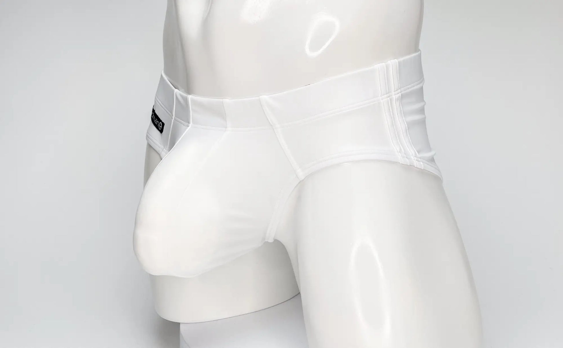 Wildmant big boy pouch swim brief white glossy finish men’s briefs with sleek form-fitting design and subtle stitching