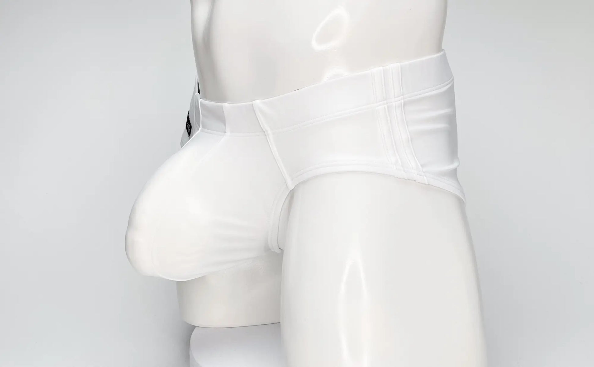 Wildmant big boy pouch swim brief white glossy latex mens briefs with smooth form fitting design and reinforced waistband stitching