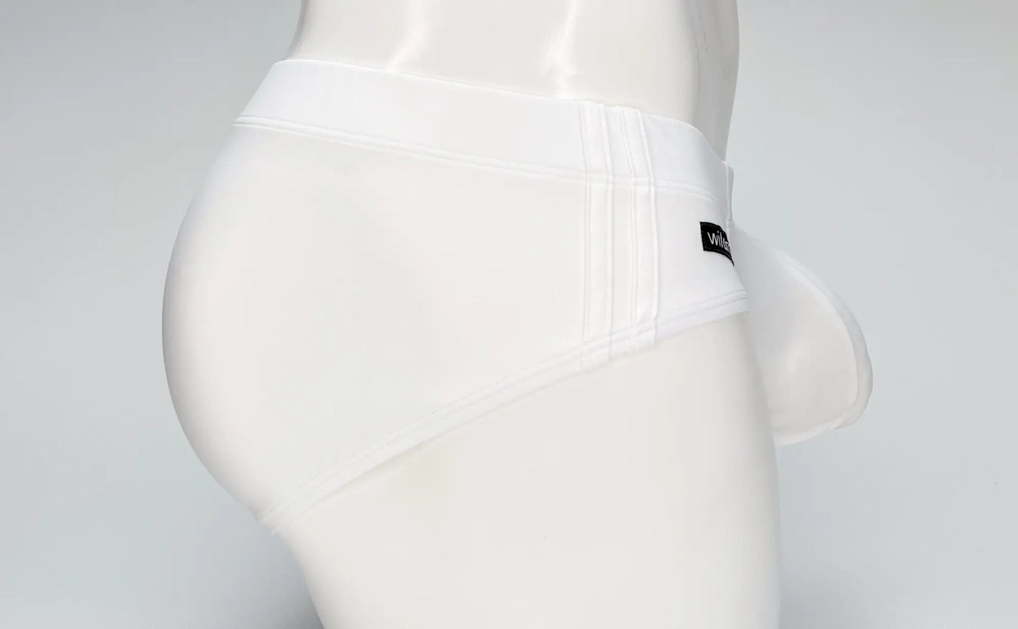Wildmant big boy pouch white swim brief with sleek form-fitting design and subtle vertical stitching on side seam