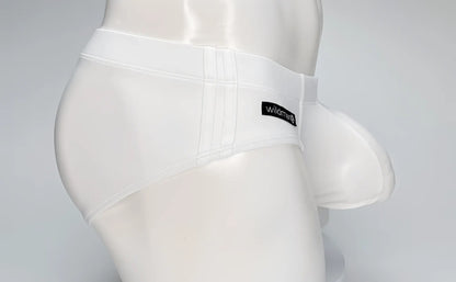 White WildmanT Big Boy Pouch swim brief on a mannequin, featuring a prominent front pouch and side stitching details.