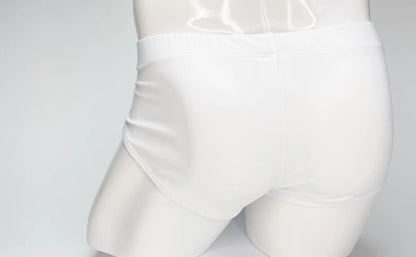 White sleek form-fitting wildmant big boy pouch swim brief with smooth glossy finish