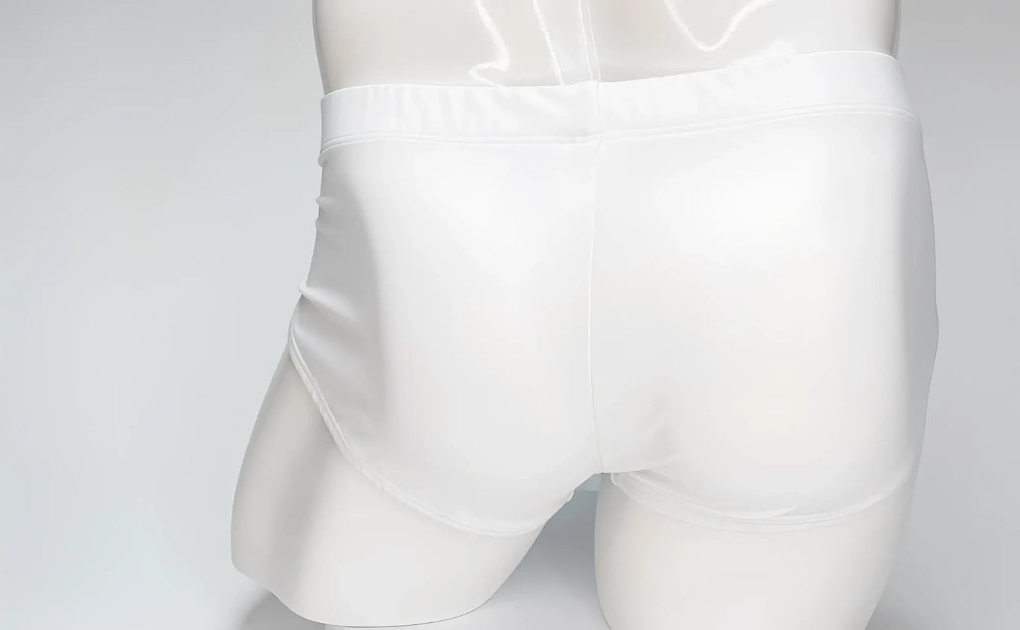 Back view of WildmanT white swim briefs on a mannequin, featuring a clean, minimalist design with full-coverage fit.
