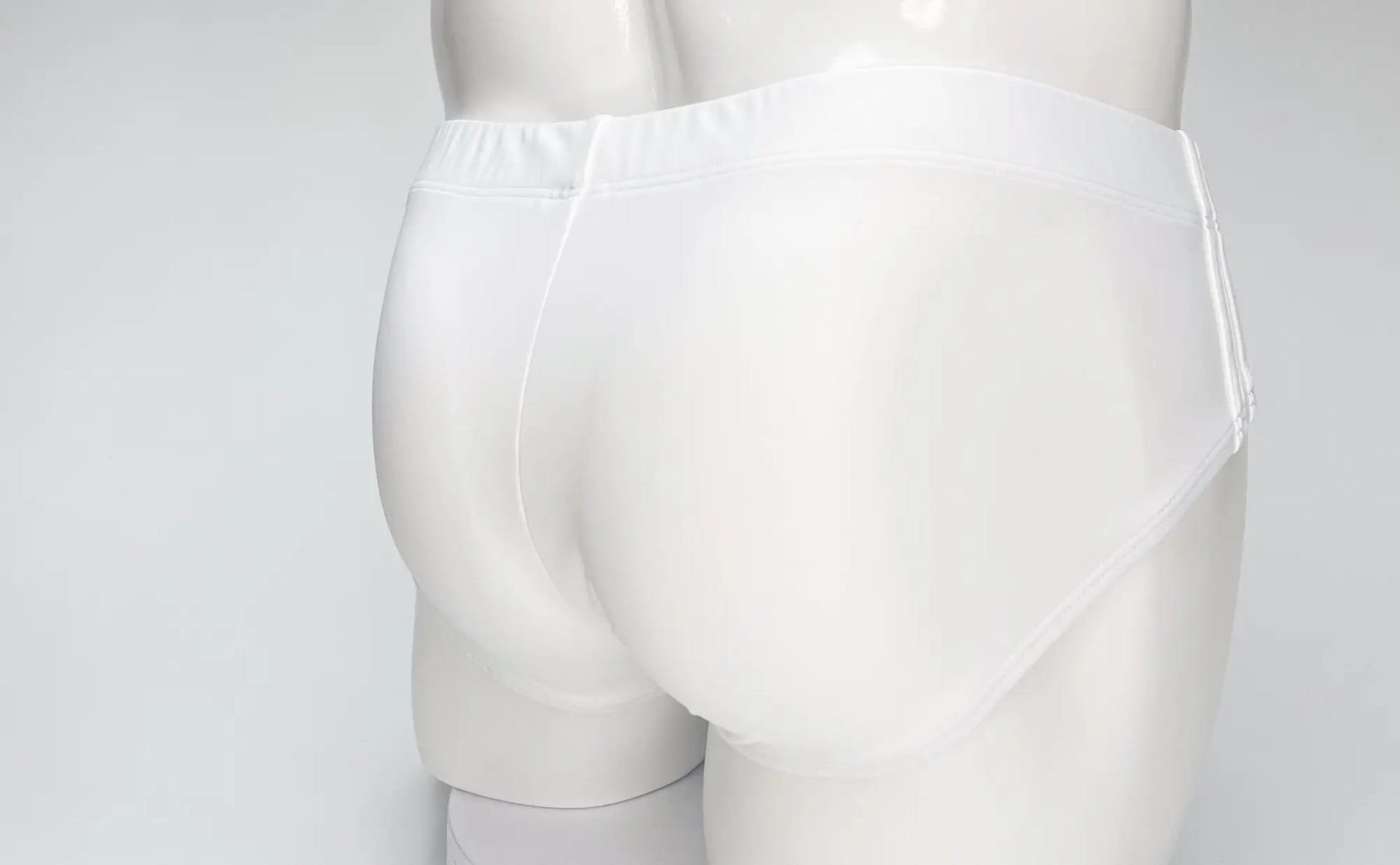 WildmanT big boy pouch swim brief white featuring a white smooth-textured fabric with a subtle elastic waistband