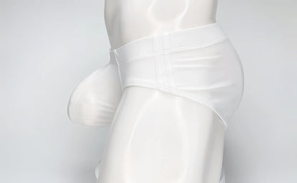 White WildmanT Big Boy Pouch swim brief with a prominent contoured front pouch on a mannequin torso.