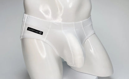 Wildmant big boy pouch swim brief in white translucent latex with black wildman brand label on waistband