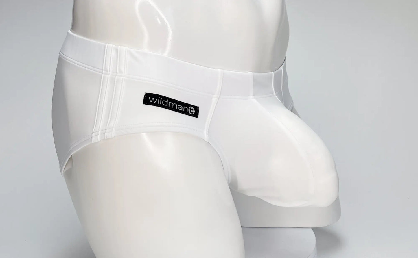 White wildman big boy pouch swim brief with smooth form fitting design and subtle seam detailing for men