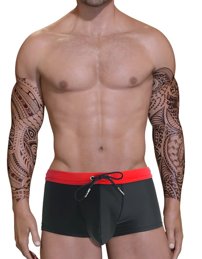 Big Boy Pouch square cut swim trunks in black with a red waistband and black drawstring.