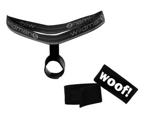 WildmanT black ball lifter harness and a separate black hook-and-loop ring with white "woof!" text.