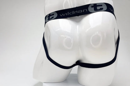 Black wildmanT cotton big boy pouch stripe jockstrap with elastic waistband briefs branded wildran on white mannequin