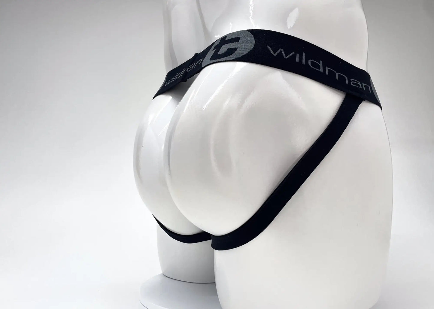 Black elastic waistband briefs with wildman branding in gray lettering part of wildmant cotton big boy pouch jockstrap