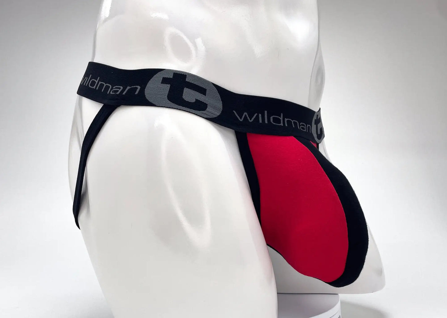 Wildmant cotton big boy pouch stripe jockstrap in red and black with gray logo waistband front view