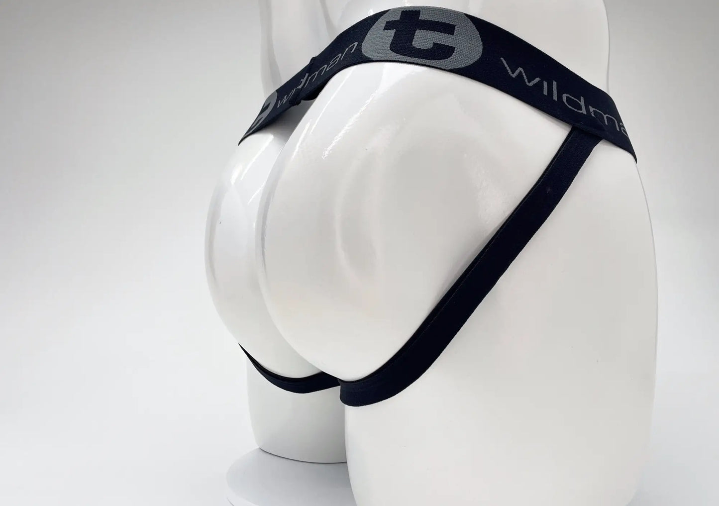 Wildmant cotton big boy pouch stripe jockstrap royal blue and baby blue with black elastic waistband featuring gray t logo and wildman branding on mannequin