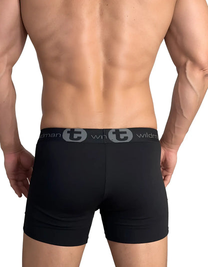 Black wildmant cotton boxer briefs with 5 inch inseam and gray waistband featuring brand logo and t emblem