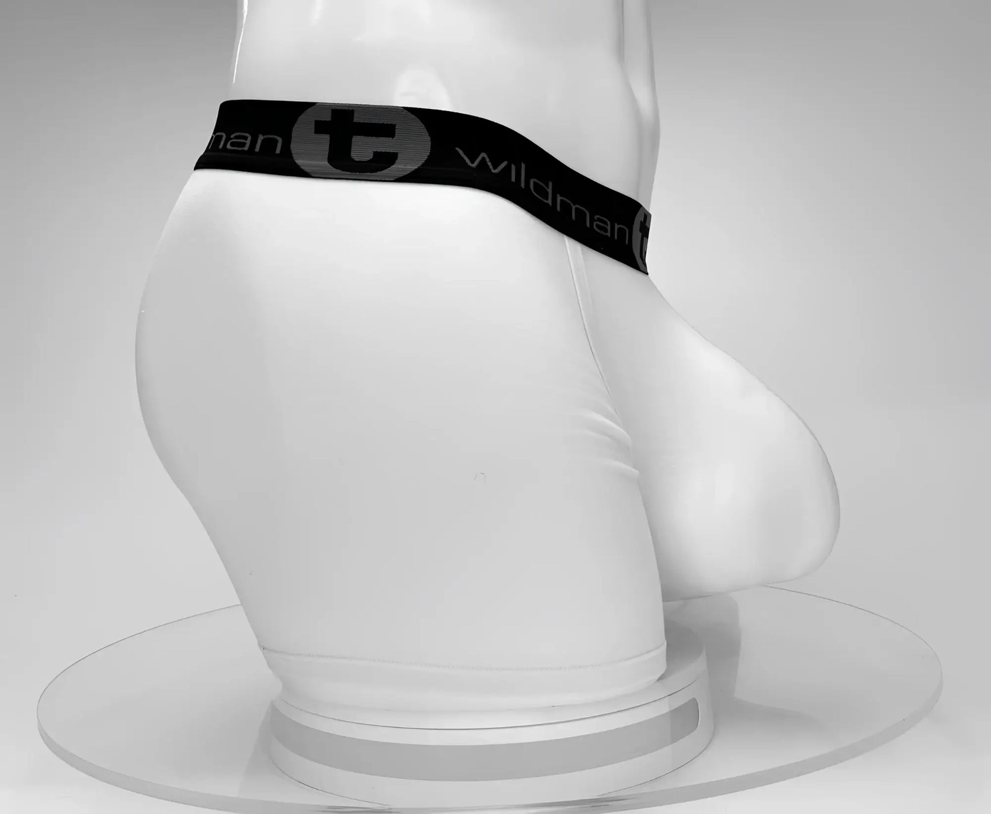 White men’s cotton boxer briefs with 5 inch inseam and black wildman elastic waistband in wildmant cotton monster cock design