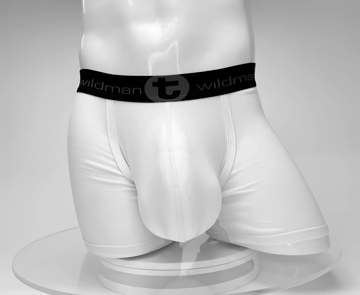 White wildman cotton boxer briefs with black elastic waistband featuring wildman logo and circular emblem