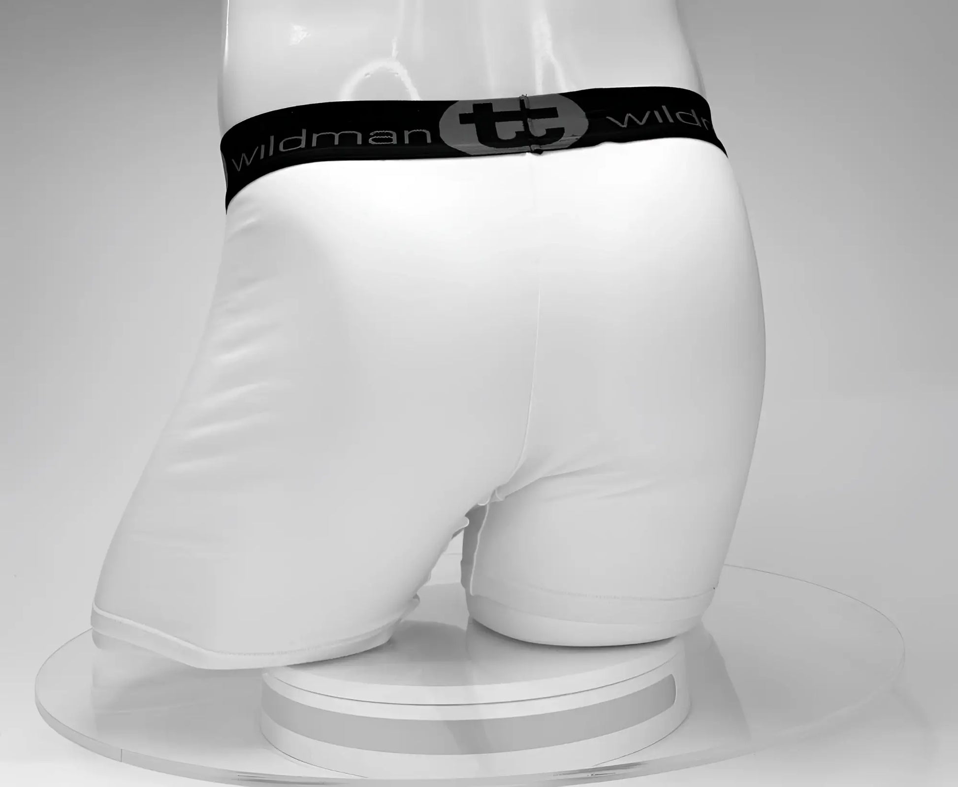 White wildman cotton boxer briefs with black elastic waistband featuring wildman logo and 5 inch inseam