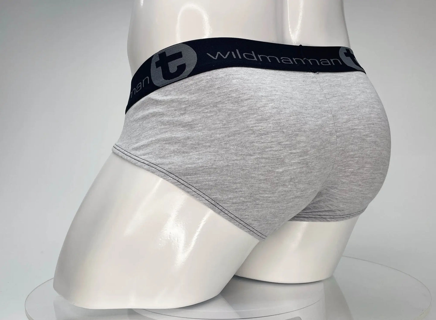 Gray heathered cotton briefs with black elastic waistband featuring wildmanman logo from WildmanT Cotton Monster Cock Brief line