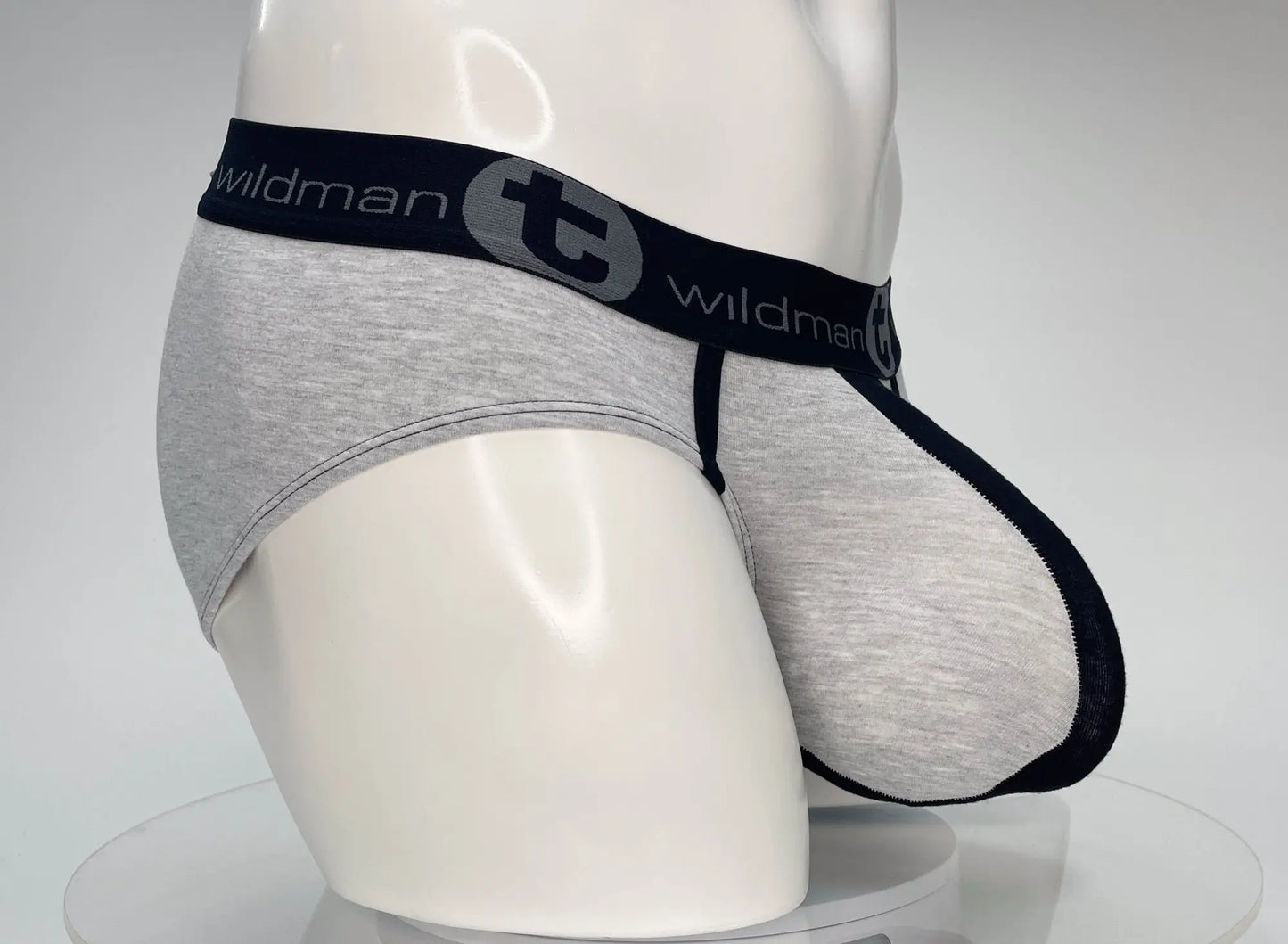 Gray heathered cotton briefs with black elastic waistband featuring wildman branding in wildmant cotton monster cock brief black and gray
