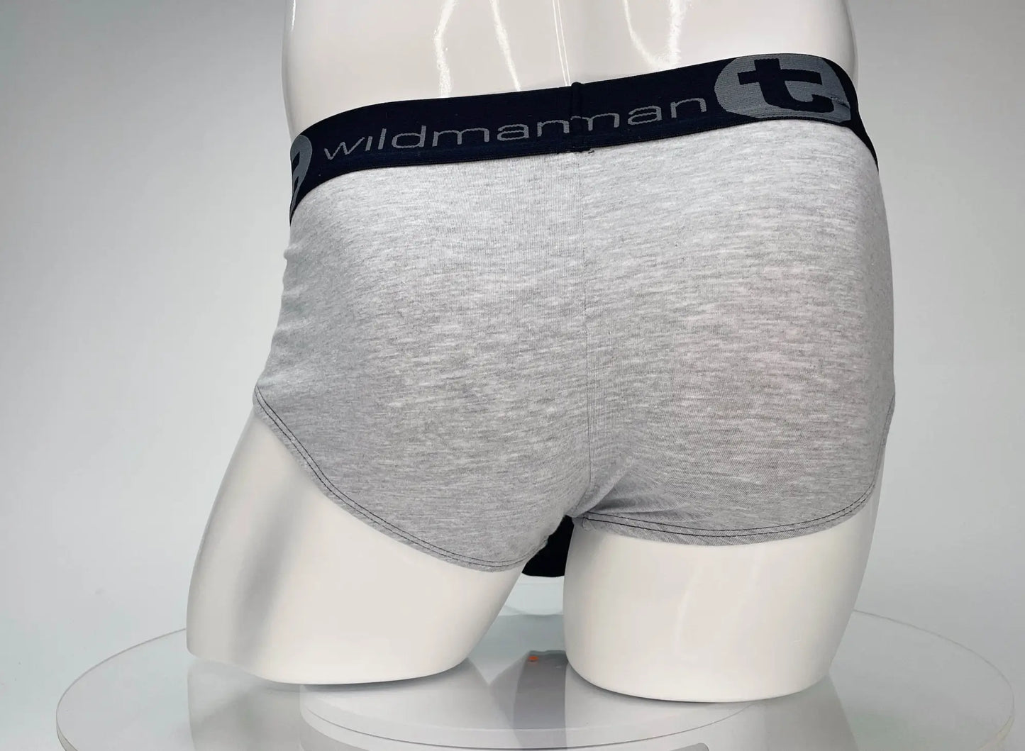Gray heathered cotton briefs with a black elastic waistband featuring the wildmanman logo for men by wildmant