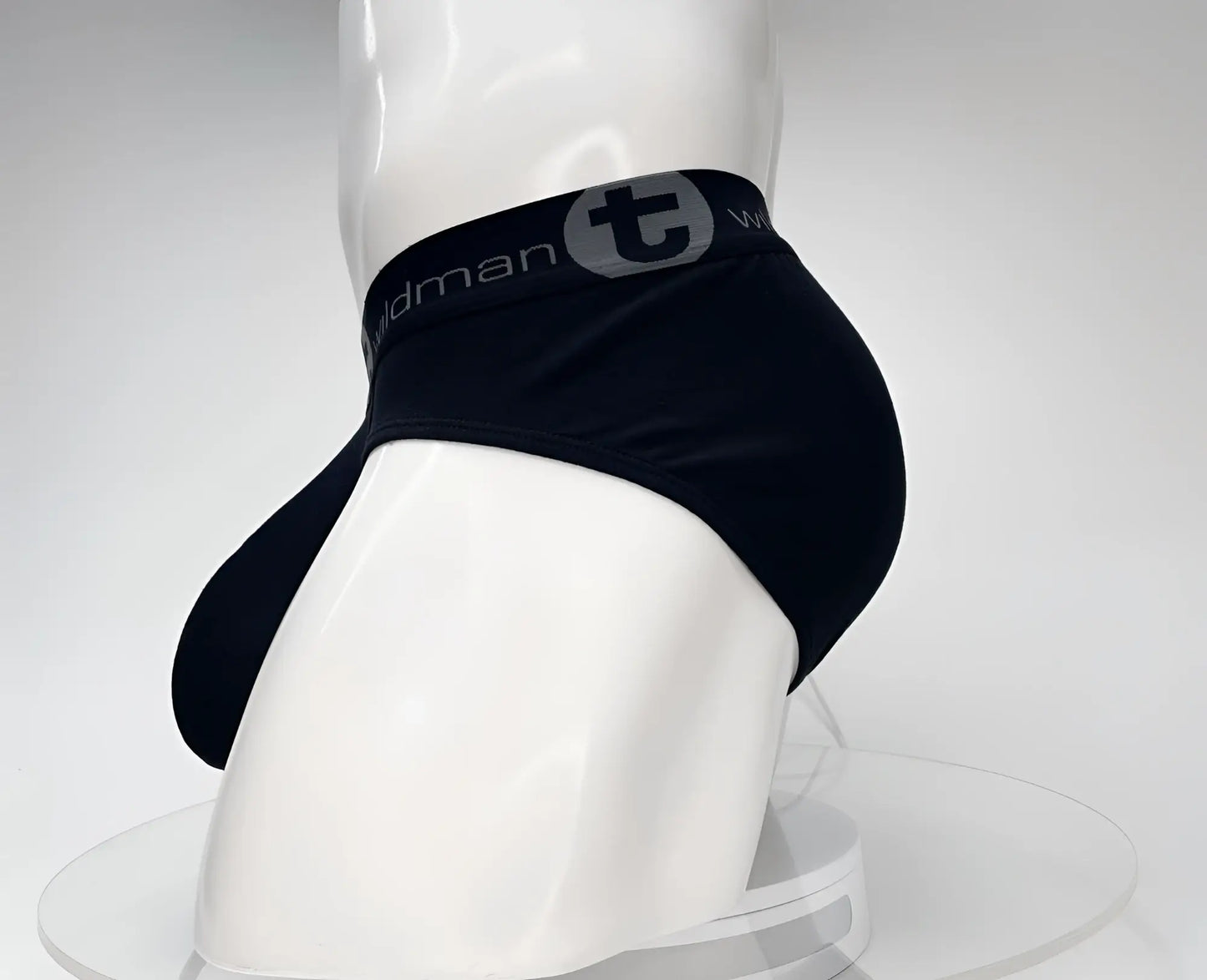 Black wildmant cotton monster cock briefs with gray elastic waistband featuring t logo and brand name