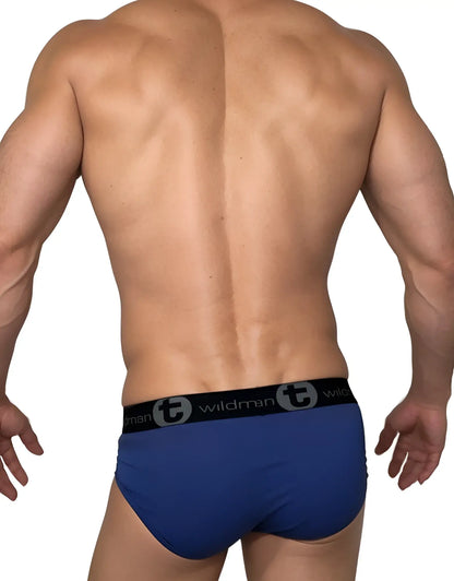 Wildmant cotton monster cock brief in dark blue and gray with black waistband featuring wildman logo and circular t emblem