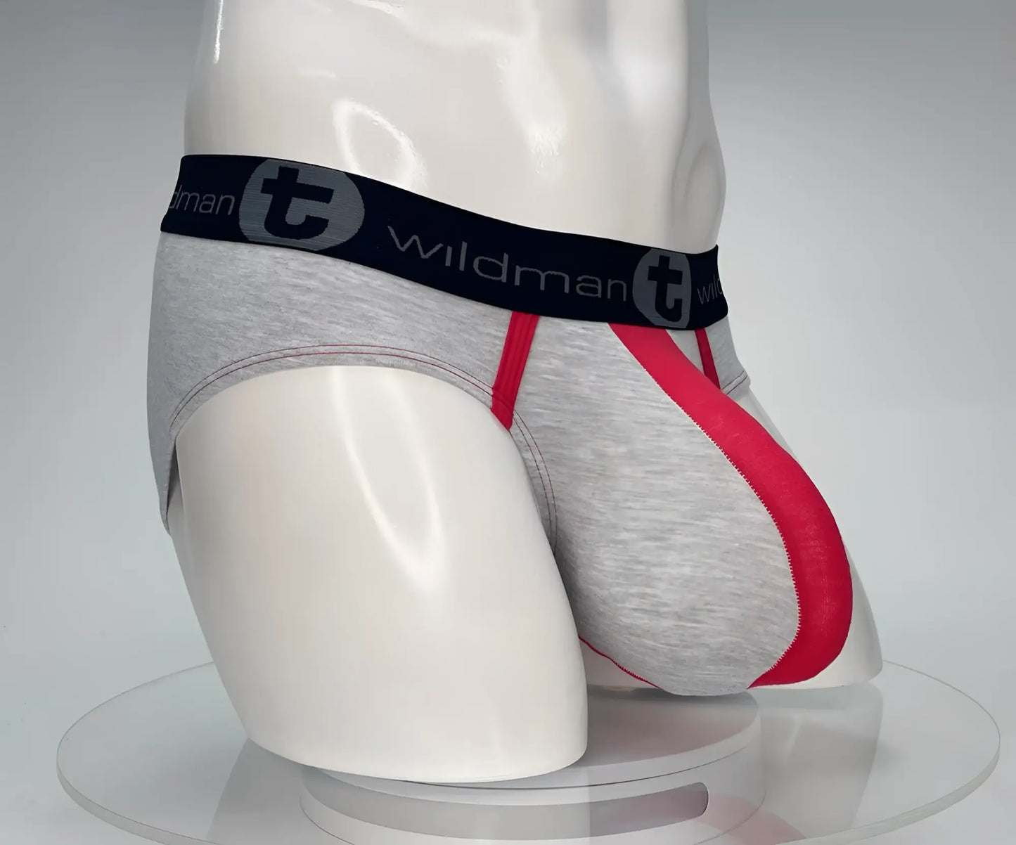 Gray and red cotton athletic briefs with black waistband featuring wildman logo wildmant cotton monster cock brief