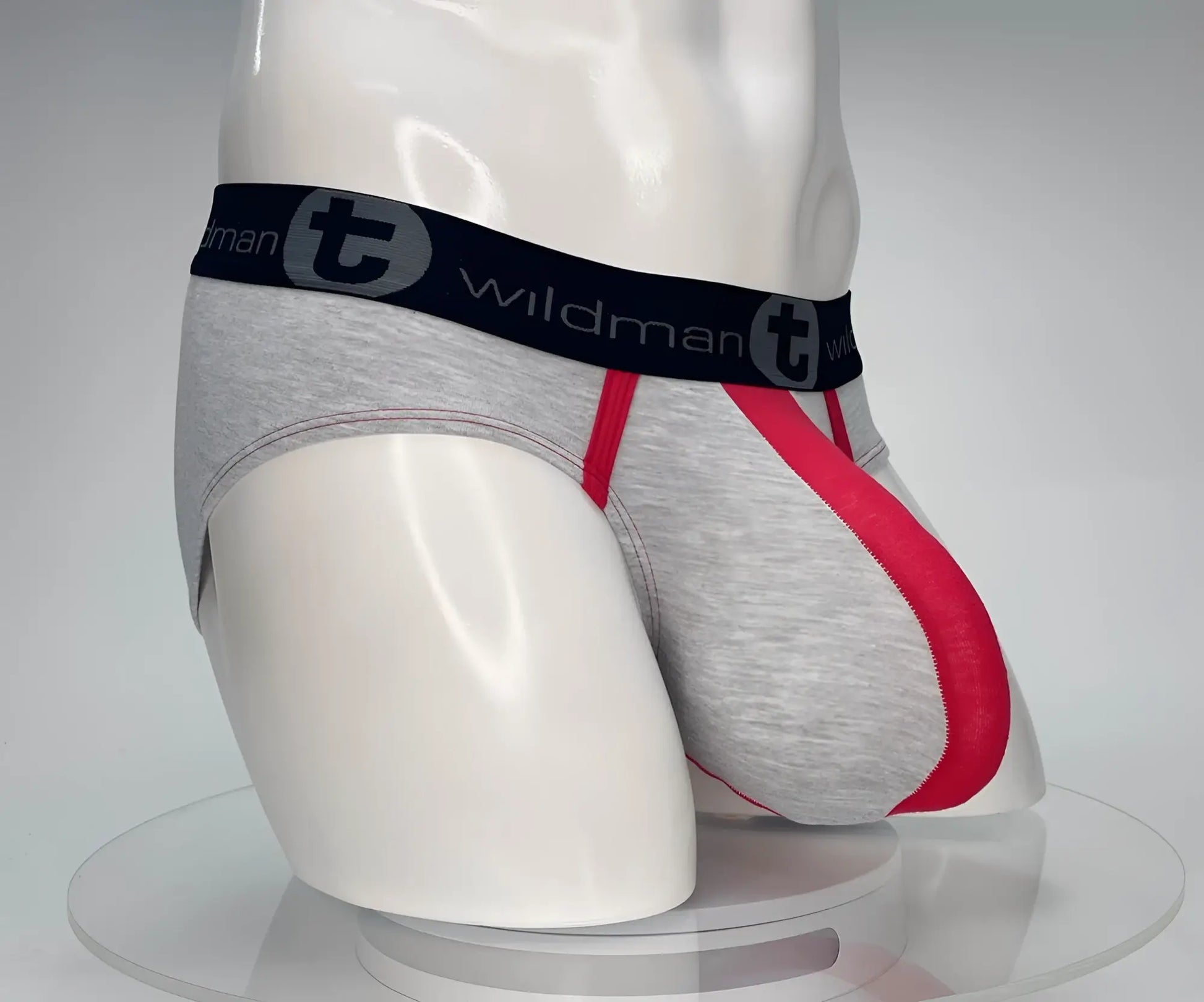 Gray and red cotton athletic briefs with black waistband featuring wildman logo wildmant cotton monster cock brief