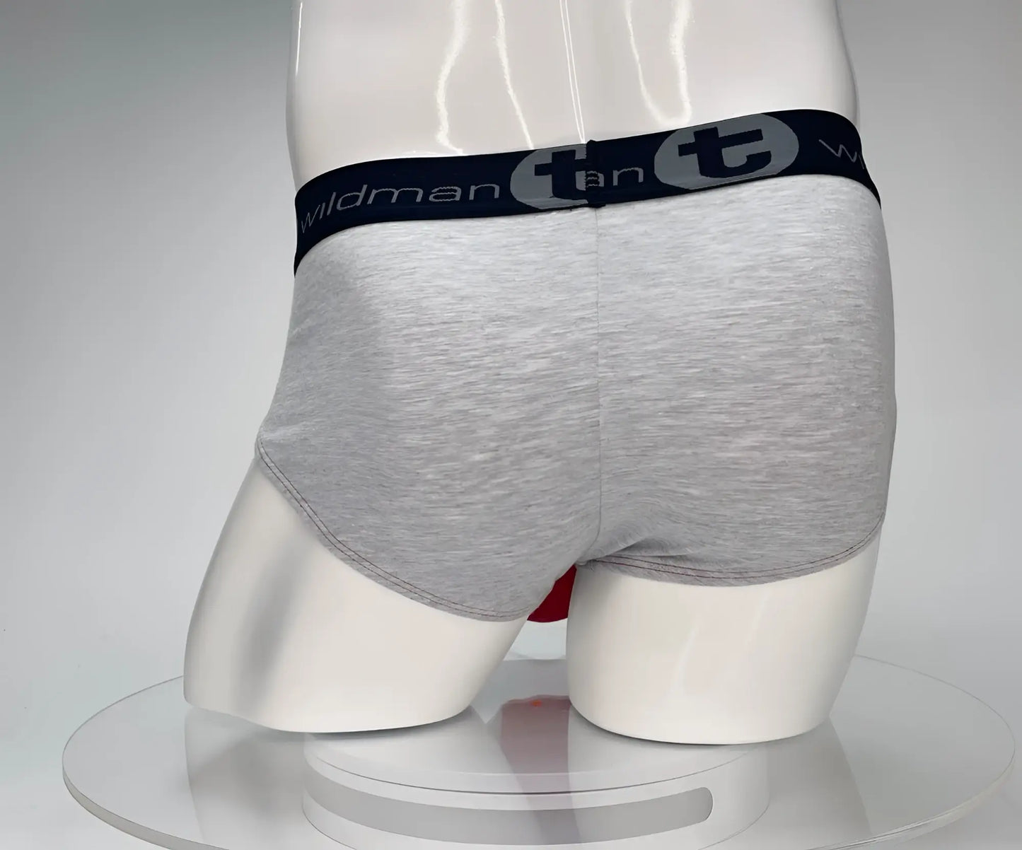 Gray heathered cotton briefs with black elastic waistband featuring wildman logo from wildmant cotton monster cock brief collection