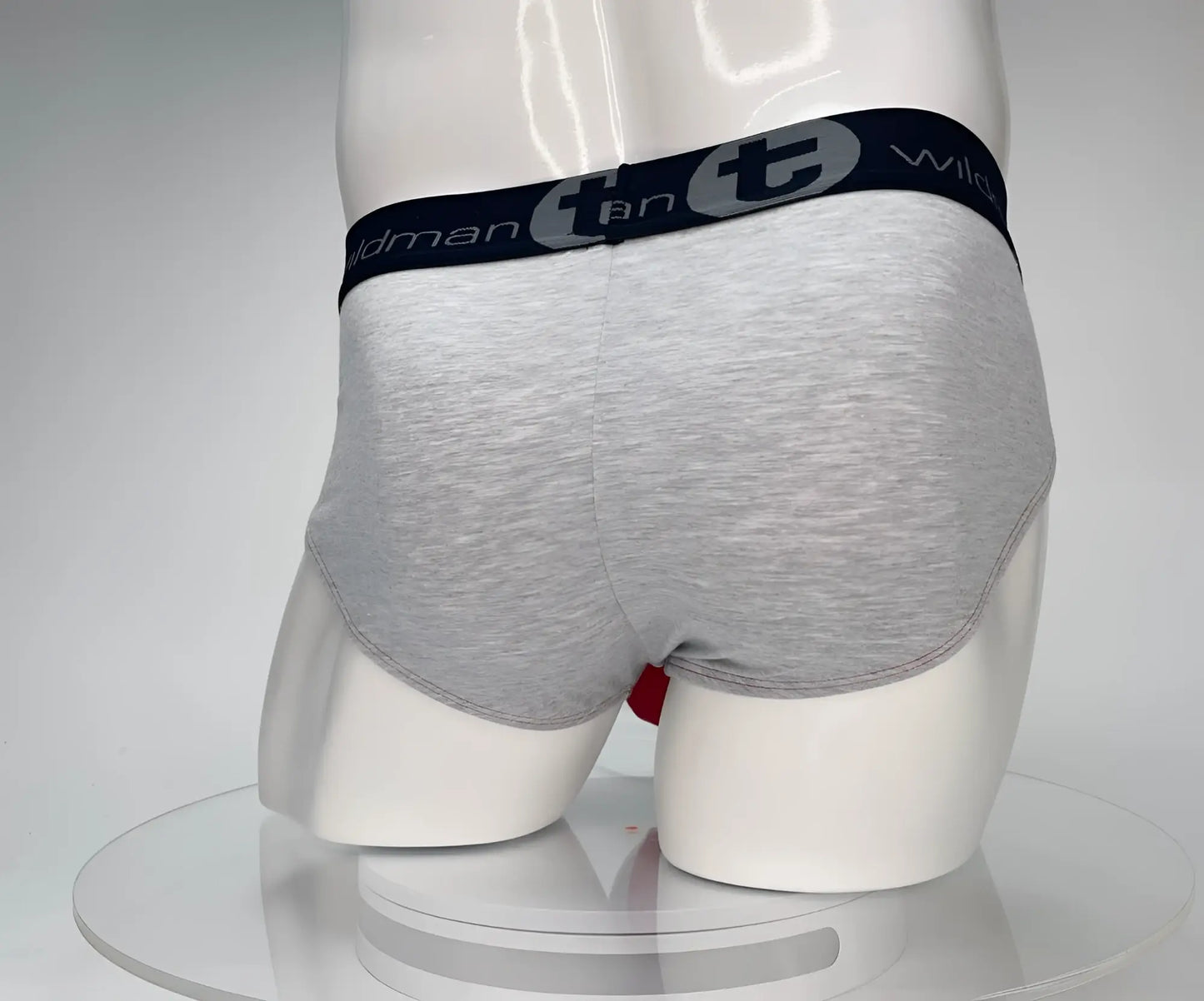 Gray heathered cotton briefs with black elastic waistband featuring wildmant and t logo from wildmant cotton monster cock brief red and gray