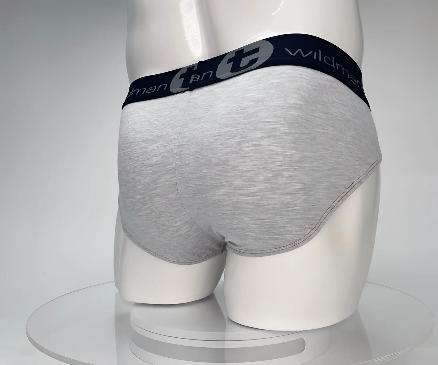 Wildmant cotton monster cock brief in gray heathered fabric with navy elastic waistband and wildman logo