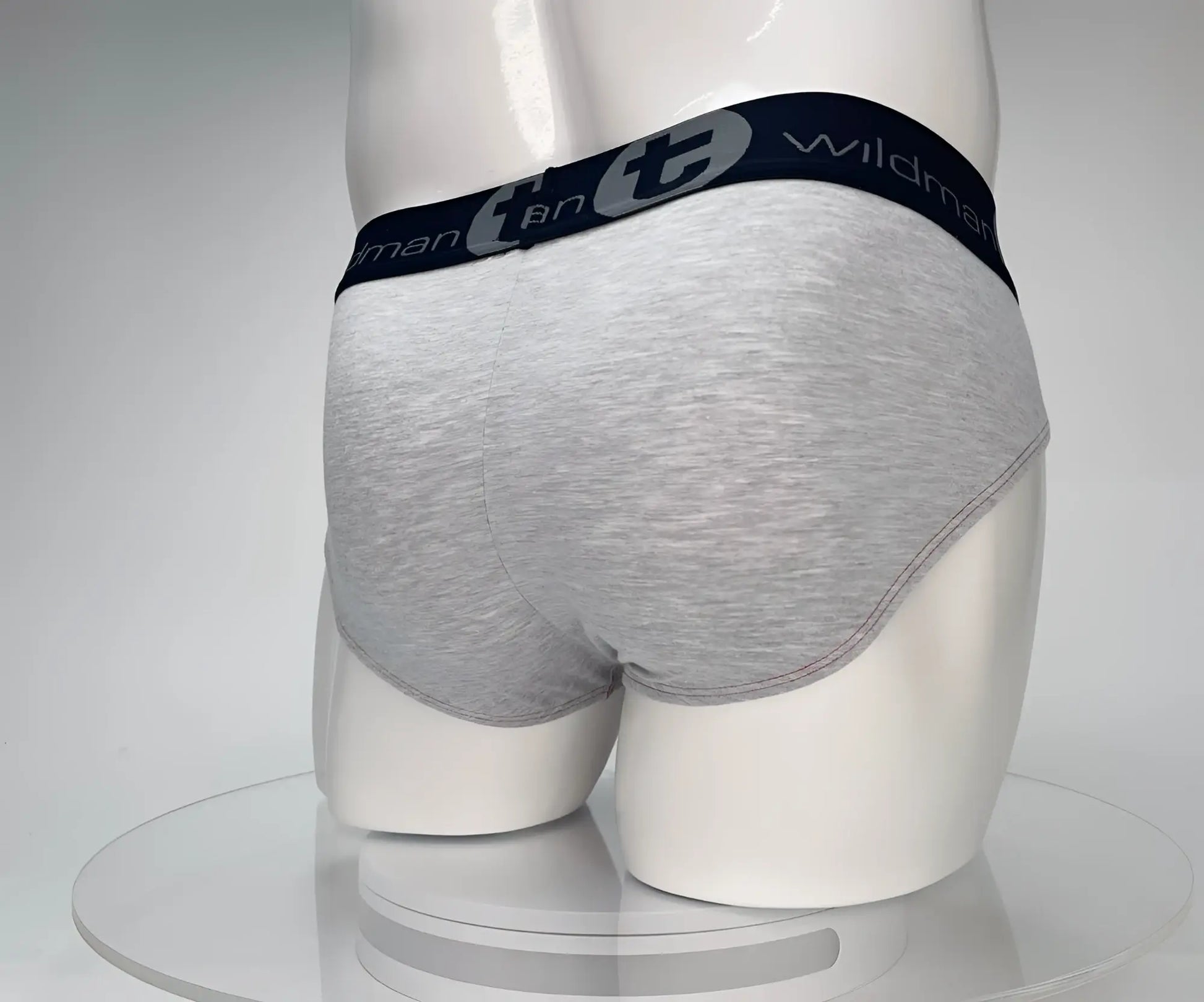 Wildmant cotton monster cock brief in gray heathered fabric with navy elastic waistband and wildman logo