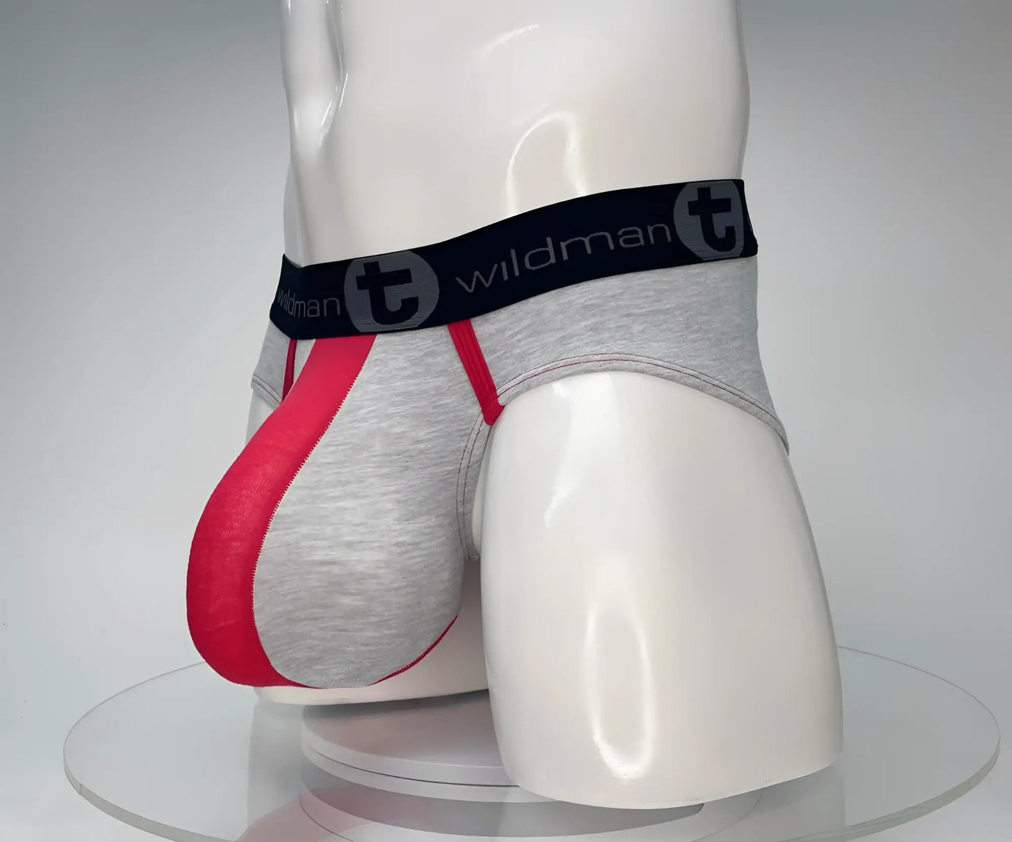Gray and red cotton men’s briefs with black waistband featuring wildman brand logo wildmant cotton monster cock brief