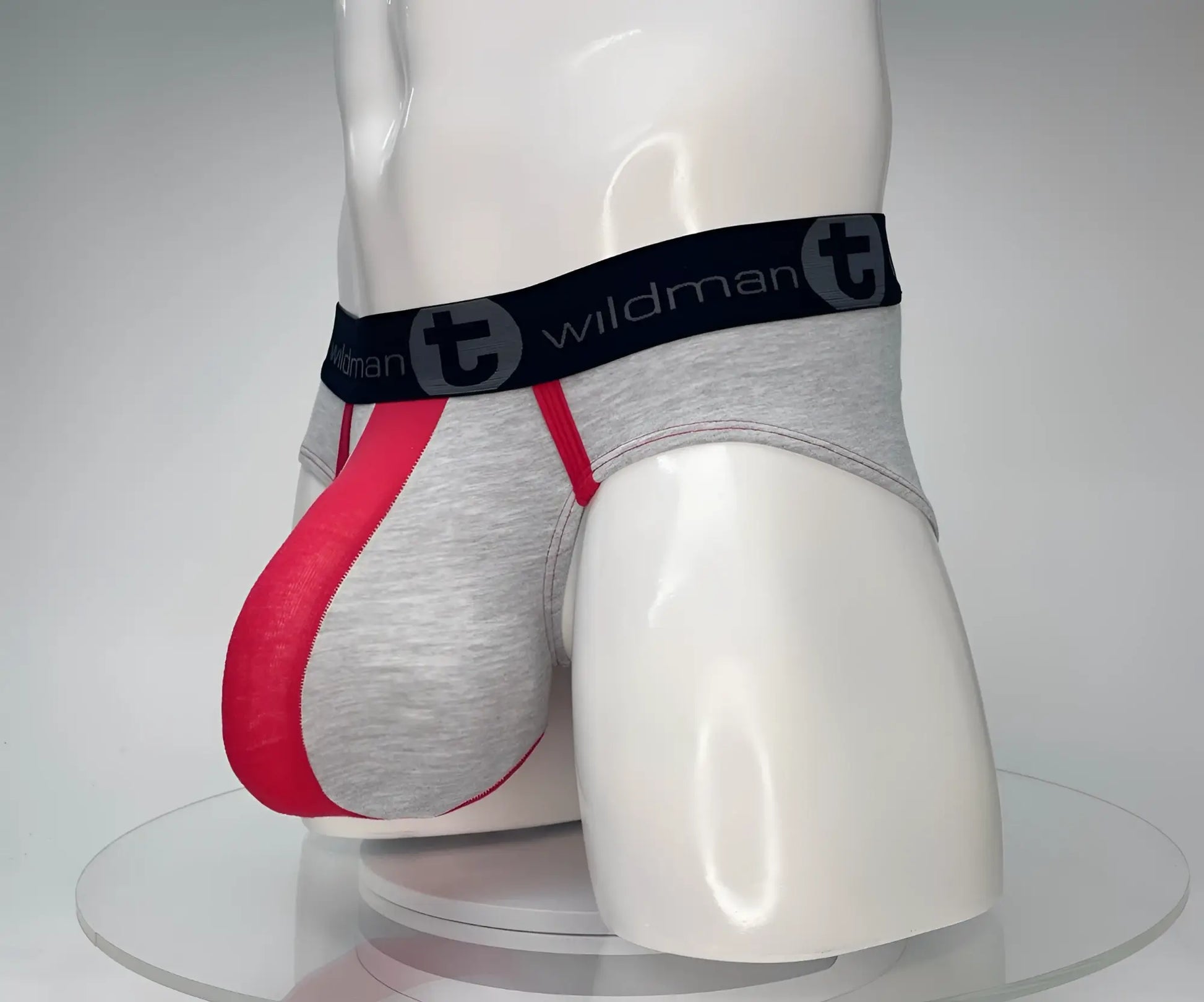 Gray and red cotton men’s briefs with black waistband featuring wildman brand logo wildmant cotton monster cock brief