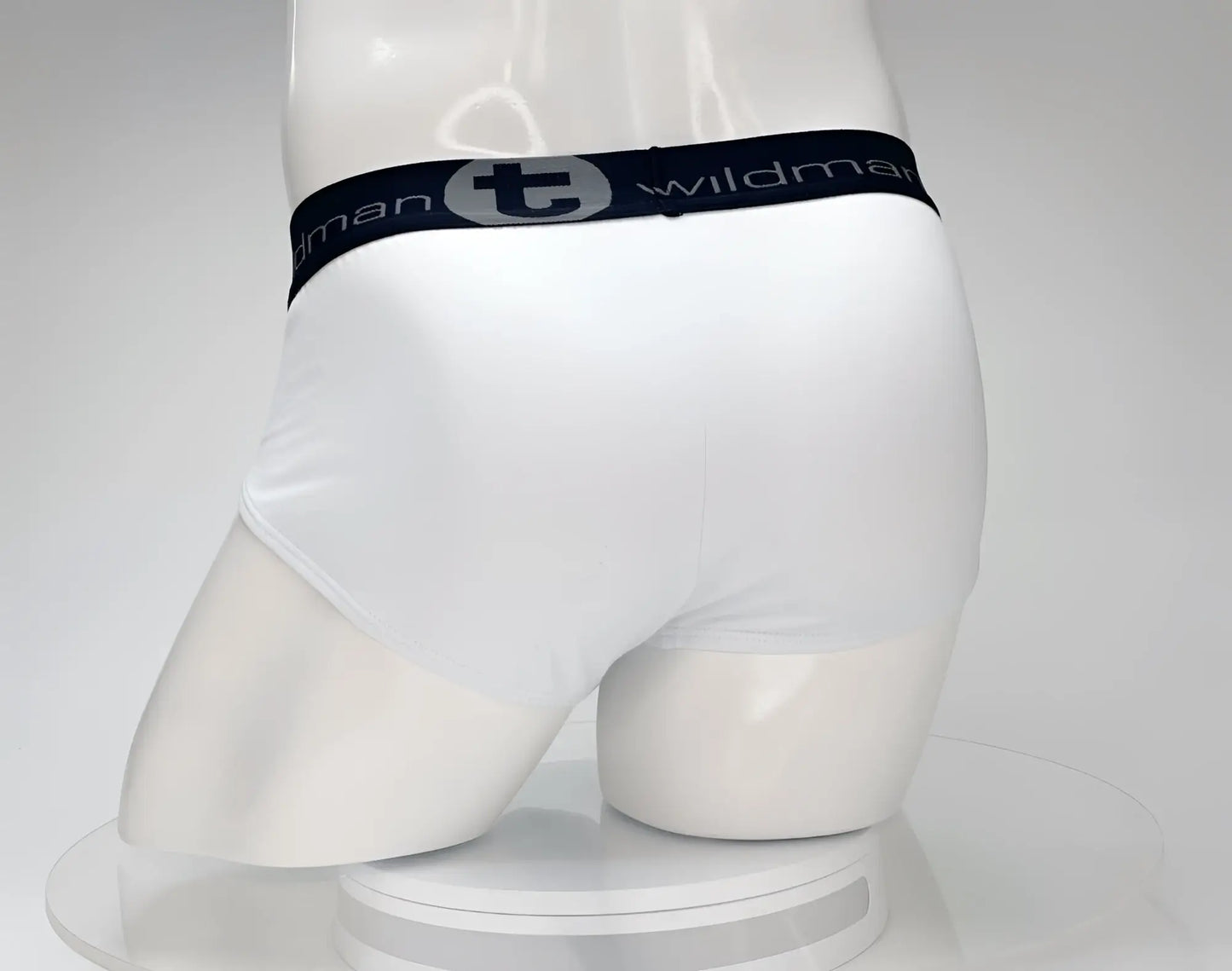 White cotton briefs with a black elastic waistband featuring the wildman brand logo wildmant cotton monster cock brief white