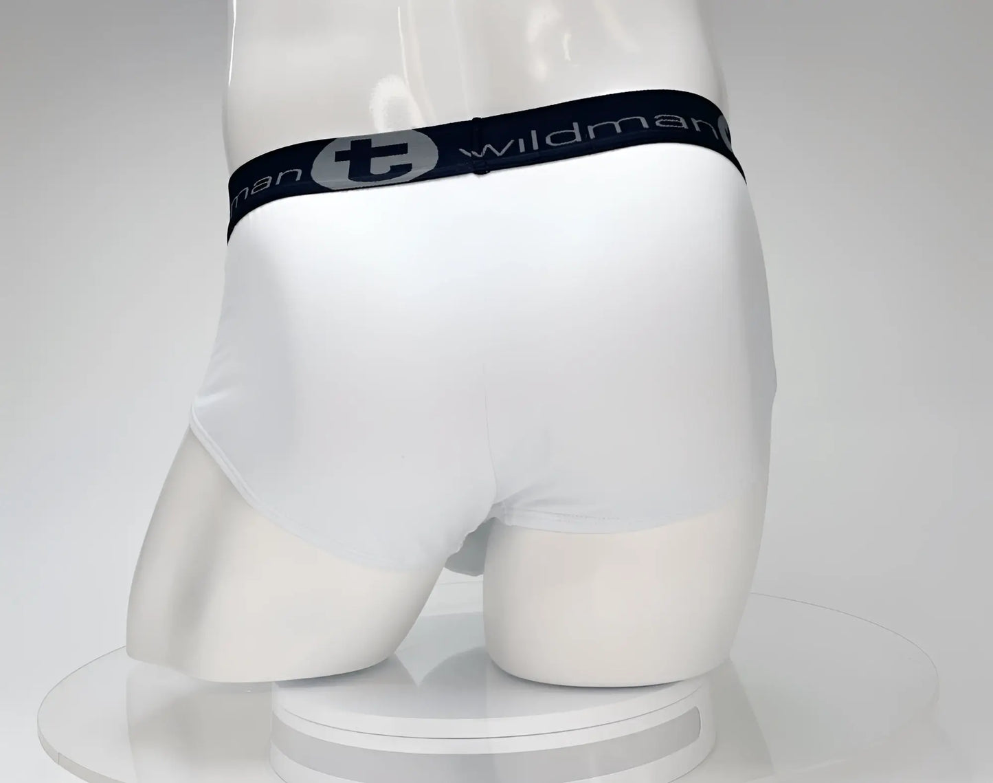 White cotton WildmanT monster cock brief with black elastic waistband featuring Wildman logo and lettering