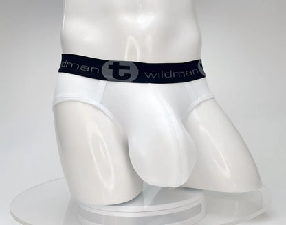 White mens cotton briefs with black elastic waistband featuring wildman brand logo and circular emblem