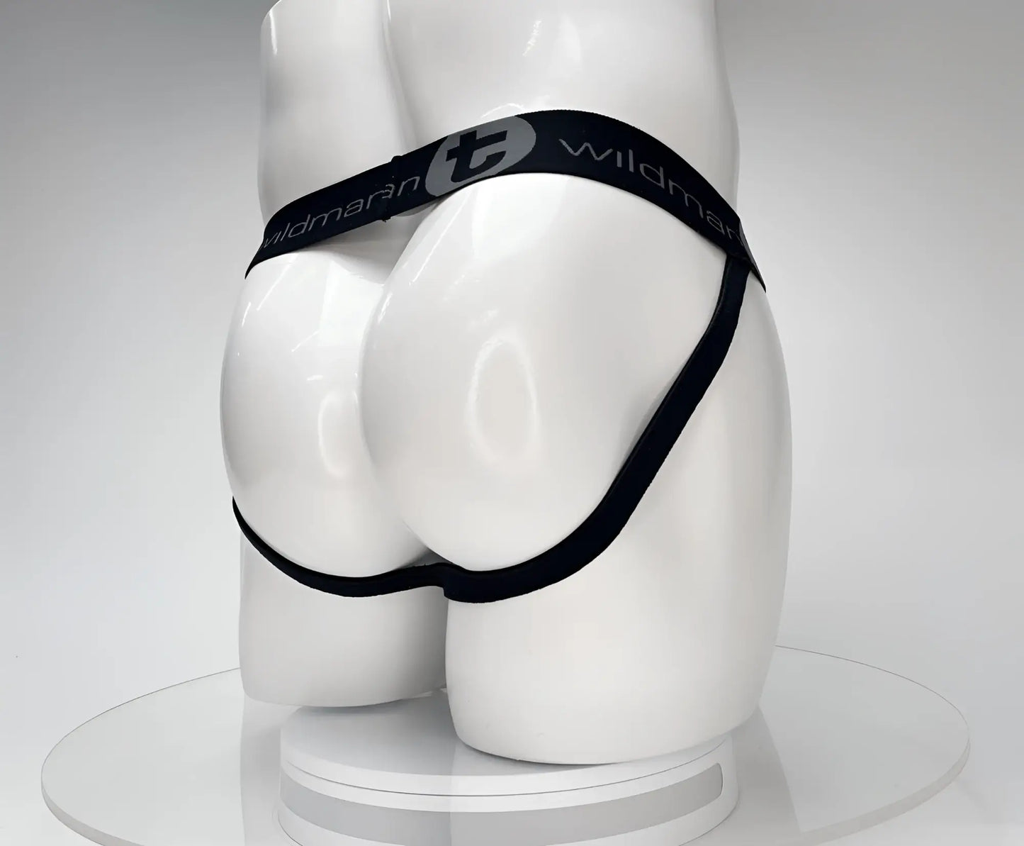 Black elastic waistband wildman cotton monster cock jockstrap on white mannequin showing front design