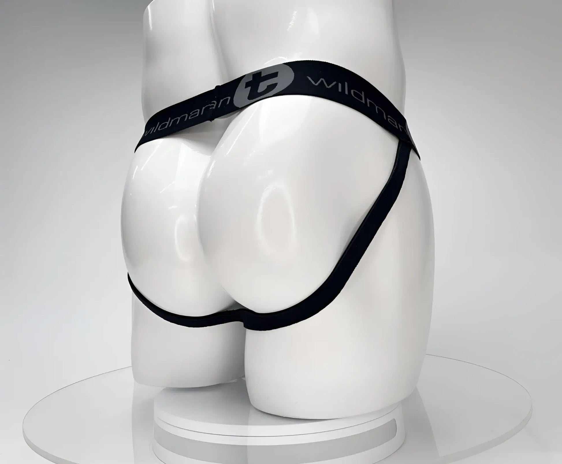 Black elastic waistband wildman cotton monster cock jockstrap on white mannequin showing front design