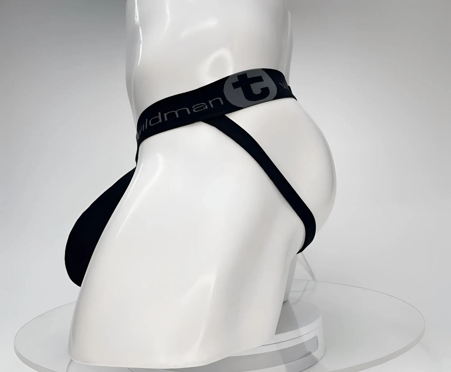 Black men’s cotton briefs with branded waistband featuring t logo and wildman text in the wildmant cotton monster cock jockstrap black product
