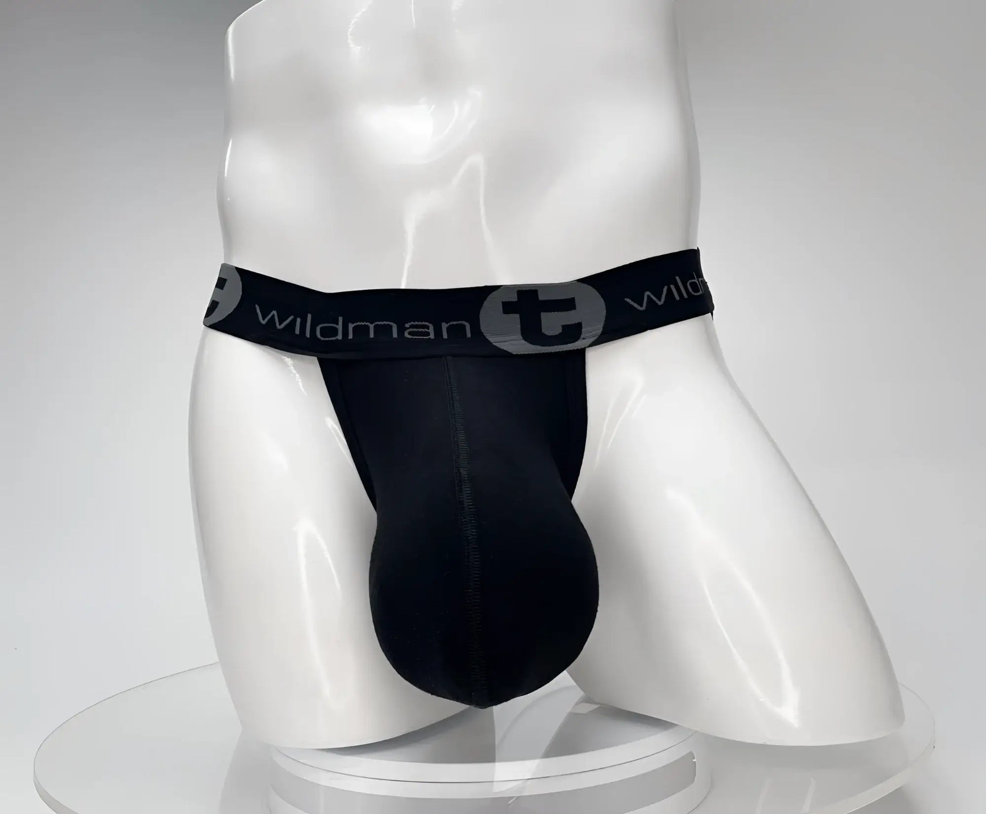 Black wildman cotton monster cock jockstrap with sleek form-fitting design and elastic waistband shown from the back