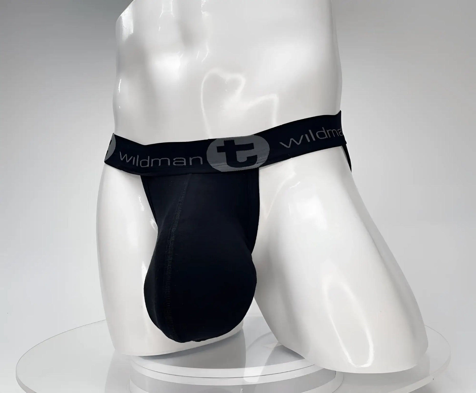 Black wildman cotton monster cock jockstrap with sleek form-fitting design and elastic waistband front view