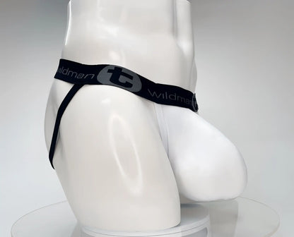 White men’s cotton thong with black elastic waistband and wildman branding featuring a gray logo