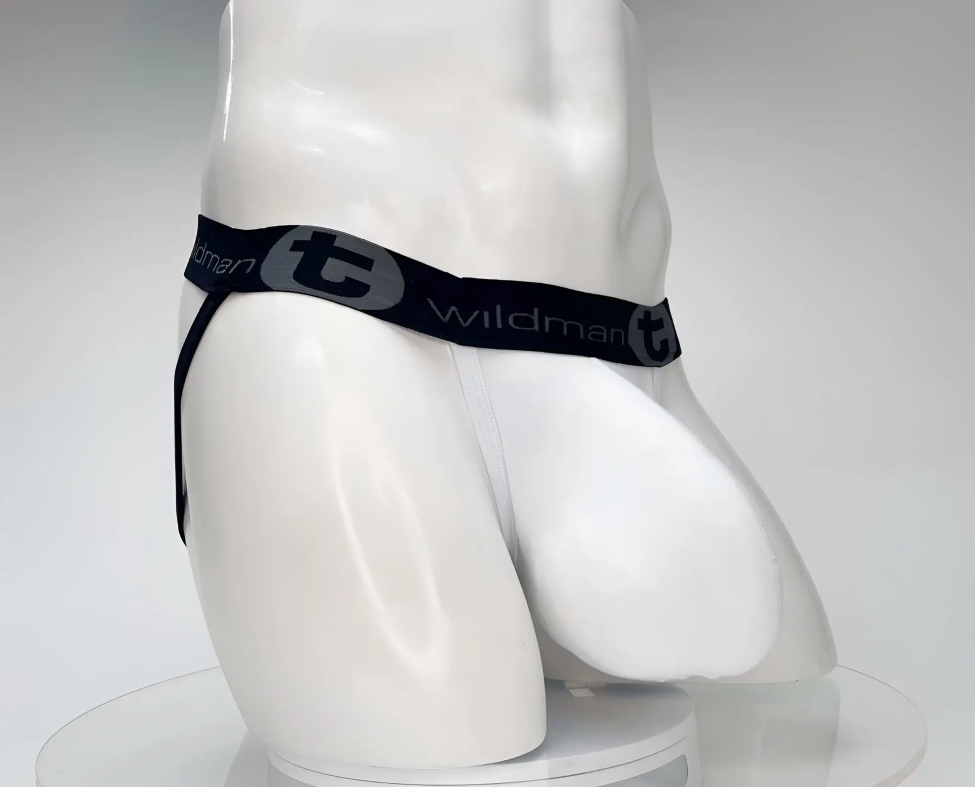 Wildmant cotton monster cock jockstrap white briefs with black elastic waistband and gray wildman t logo