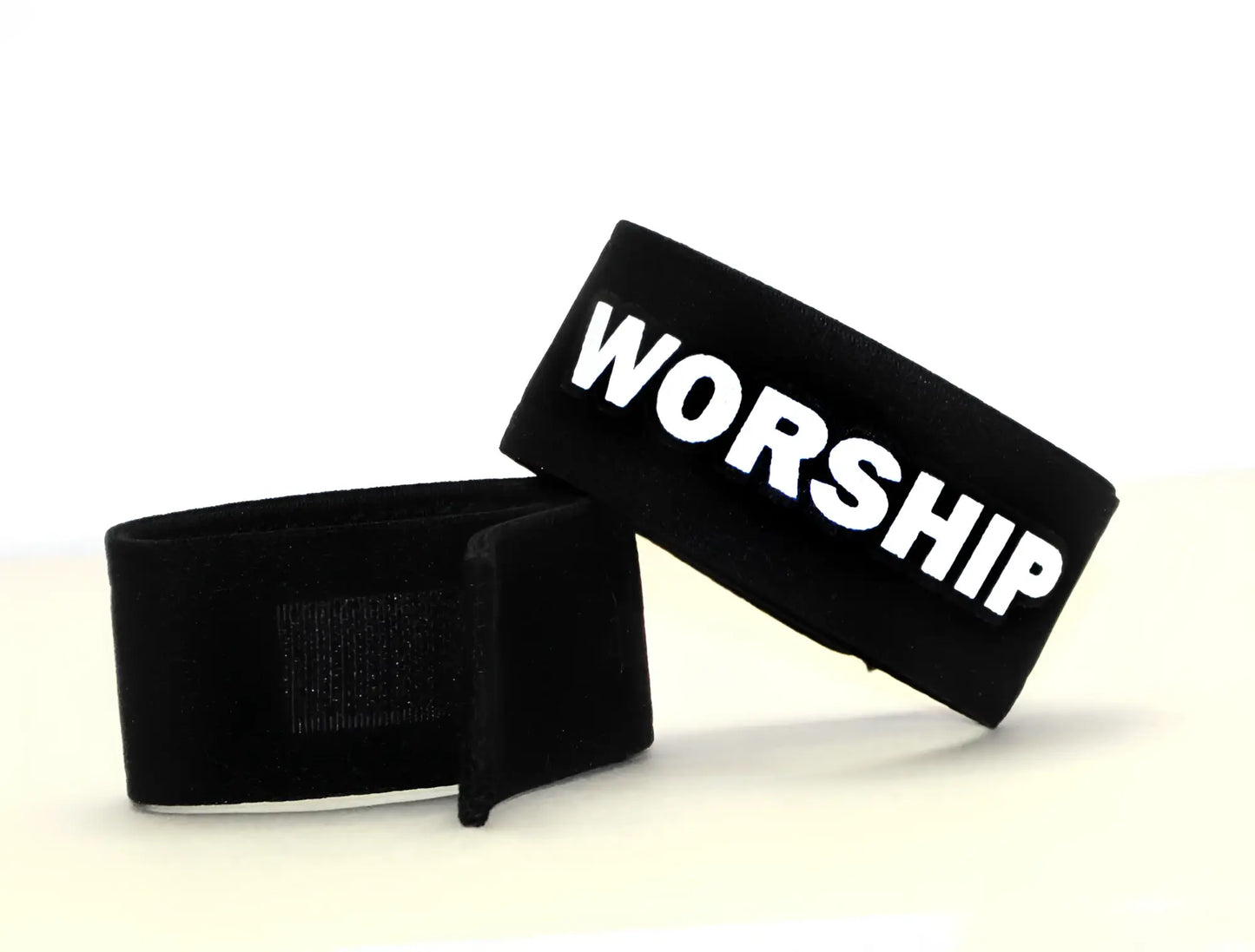 Wildmant fetish max cock ring wristband black with bold white worship lettering and velcro closure