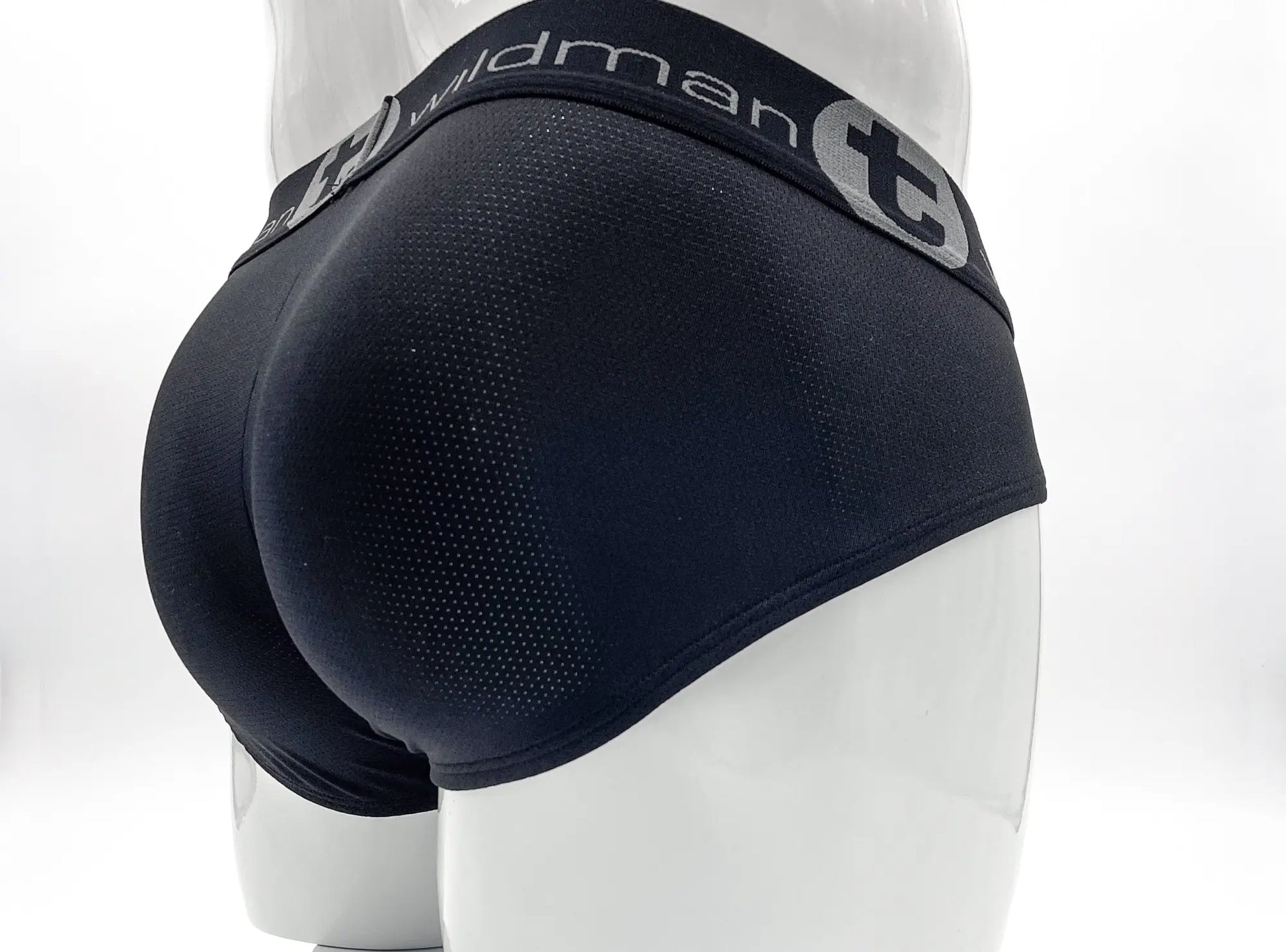 Wildmant mesh big boy pouch brief black with perforated mesh texture and gray branding on the waistband