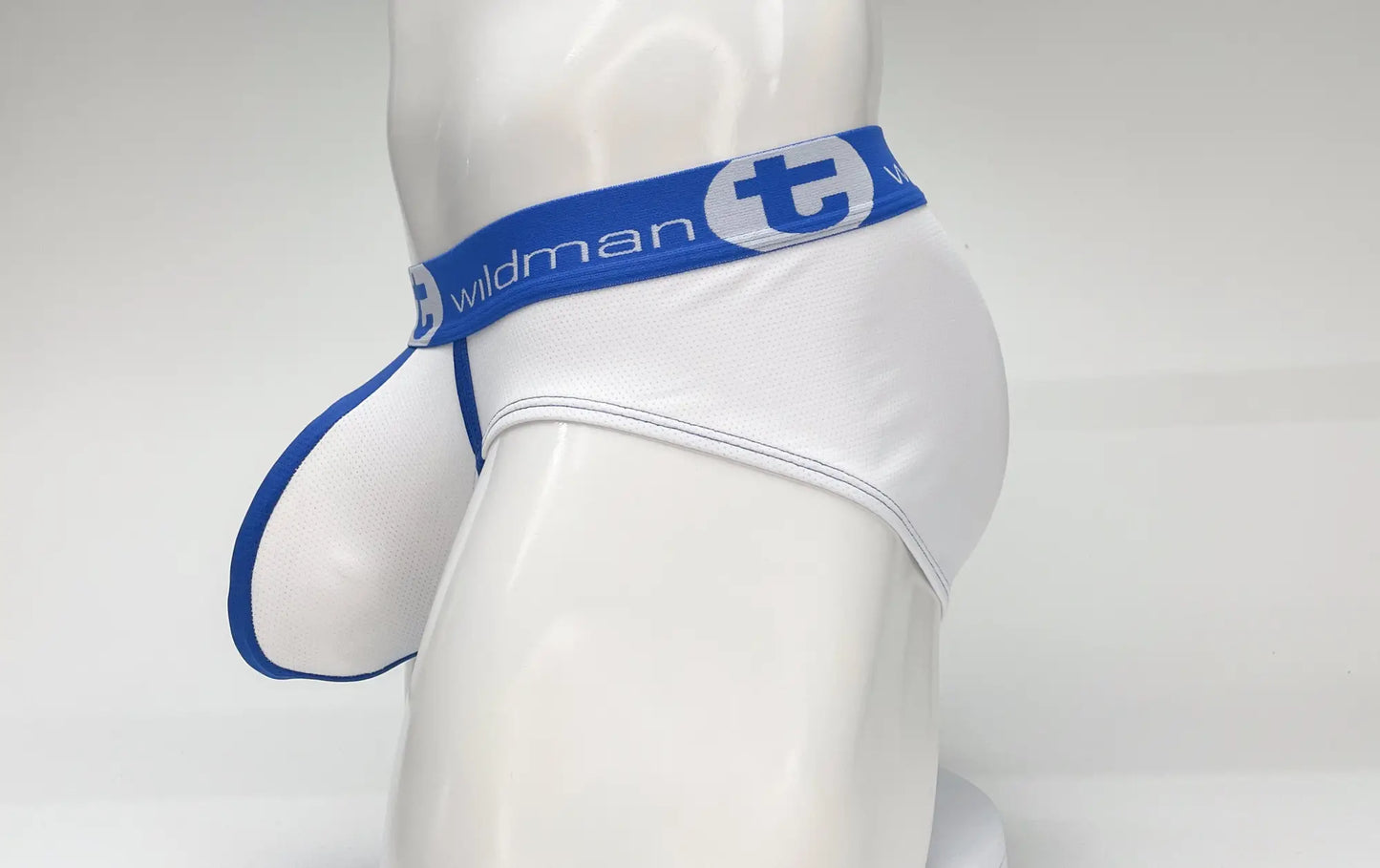 White mens mesh briefs with blue trim and a wildman branded waistband featuring a big boy pouch design