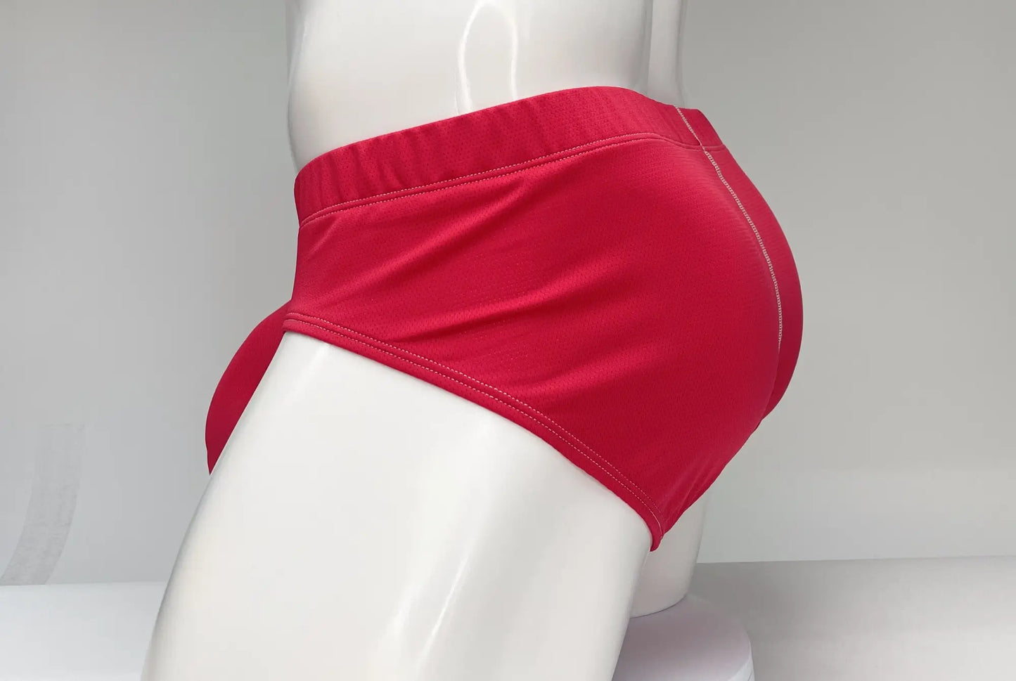 WildmanT mesh brief red smooth bright red fabric briefs with snug elastic waistband and subtle stitching details